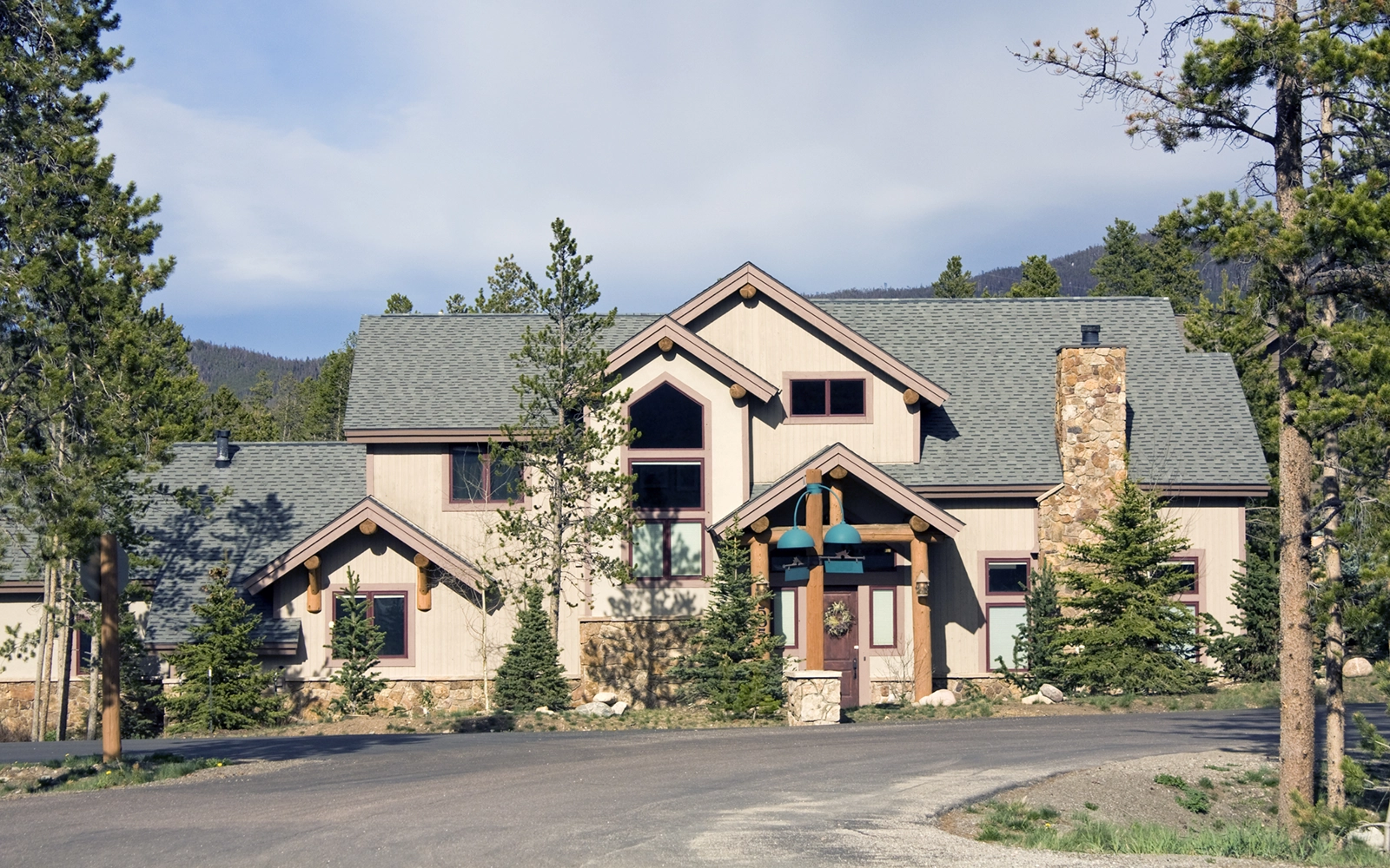 Mountain-style Colorado second home surrounded by pines — Vail Valley Home Watch services